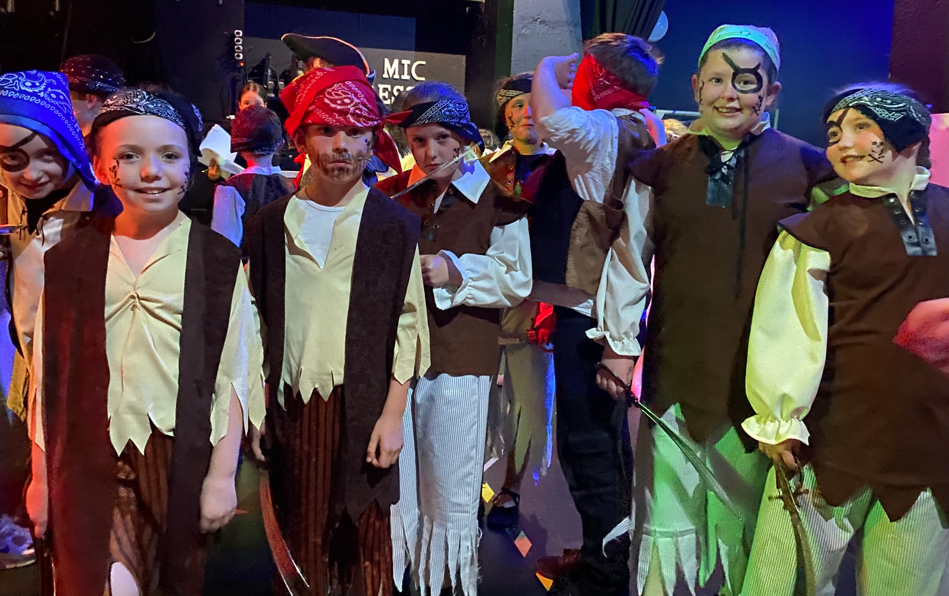 Students in pirate costume backstage